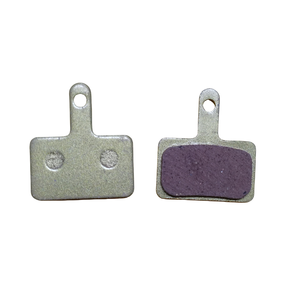 A pair of rectangular copper-colored semi-metallic brake pads for the KuKirin G4 electric scooter, showing both the friction material and the metal backing plate with a single mounting hole.